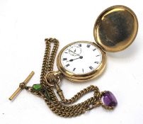 A gold plated full hunter pocket watch with Albert chain.