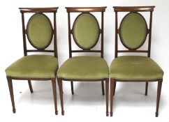 Three 20th century mahogany chairs.