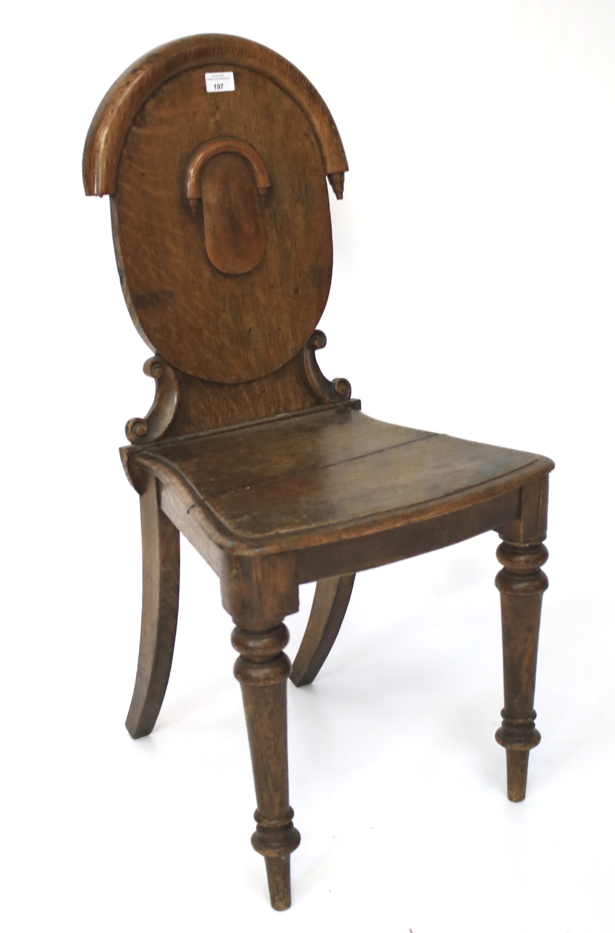 A 19th century oak hall chair.