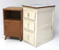 Two contemporary cabinets and a Canterbury. including a Heals style 'Alfred Cox design'.