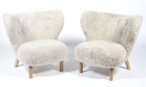 Two contemporary Danish style chairs.