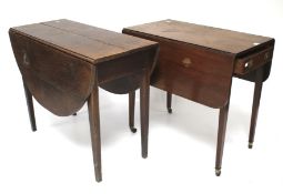 A Victorian mahogany Pembroke table together with an oak drop leaf table.