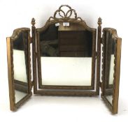 A gilt framed triptych dressing table mirror.