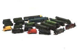 An assortment of OO gauge model railway locomotives and tenders.