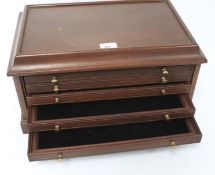 A contemporary mahogany coin storage/collector's cabinet with five shallow drawers. L45cm x D29.