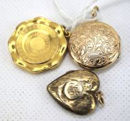 Three 9ct gold and yellow metal lockets.