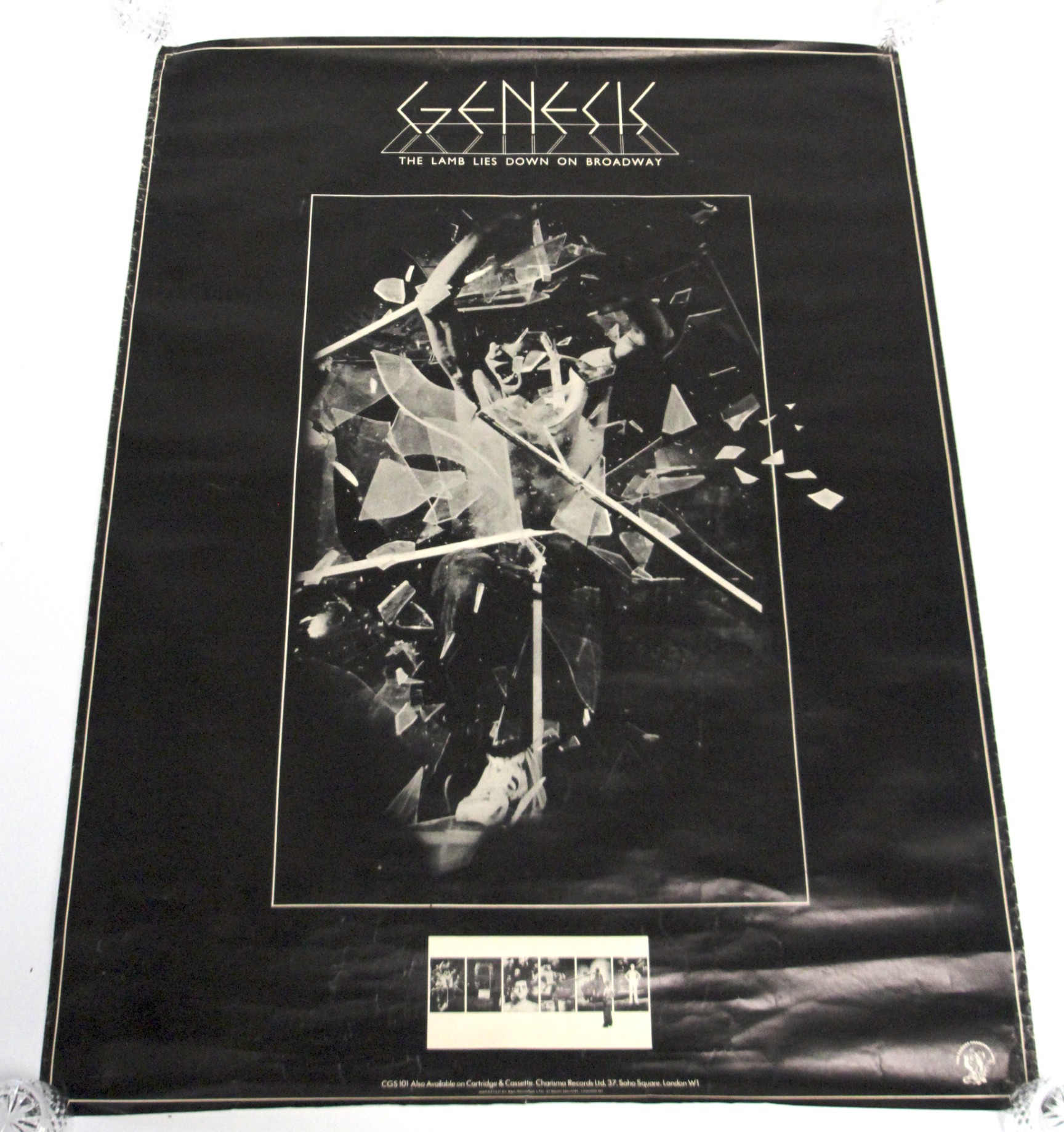 A Genesis 'The Lamb Lies Down on Broadway' album poster.