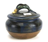 A 20th century studio pottery lidded pot.