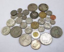 A collection of US dollars and other coins.