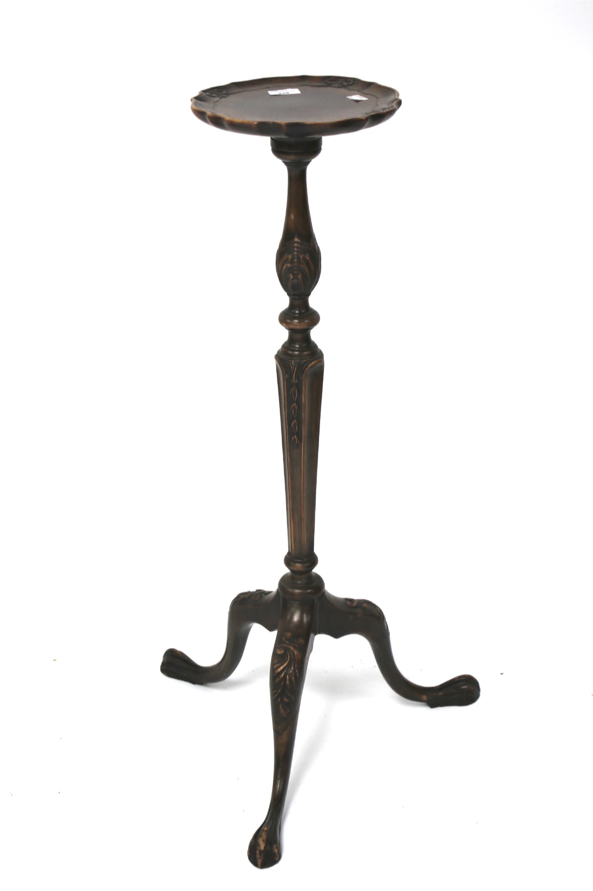 An early 20th century mahogany plant stand.