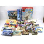 An assortment of model kits for aircraft, cars and ships.