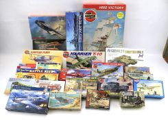 An assortment of model kits for aircraft, cars and ships.