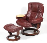 A Stressless chair with footstool.