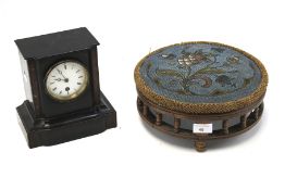 A contemporary wooden mantle clock and a Urquhart & Adamson footstool.