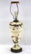 A late 19th century Bria & Sons ceramic adapted table lamp.