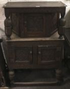 A 19th century oak hall cupboard.