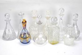 Ten 20th century glass decanters.