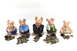 Five Wade Natwest pigs.