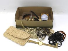 An assortment of costume jewellery and watches.