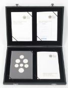 A 2008 silver proof collection of Emblems of Britain with seven coins, boxed.