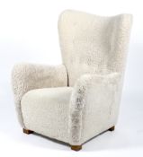 A contemporary Danish style armchair.
