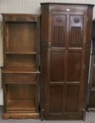 A mid-century veneered wardrobe and an oak display unit.