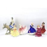 Five Royal Doulton ladies and a Lladro style Rex figure.