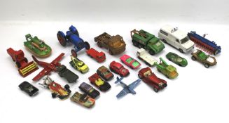 An assortment of playworn diecast vehicles.