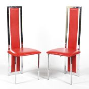 A pair of Italian high backed dining chairs in chrome with red upholstery. H110.