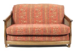 An Ercol upholstered Golden Dawn bergere suite.