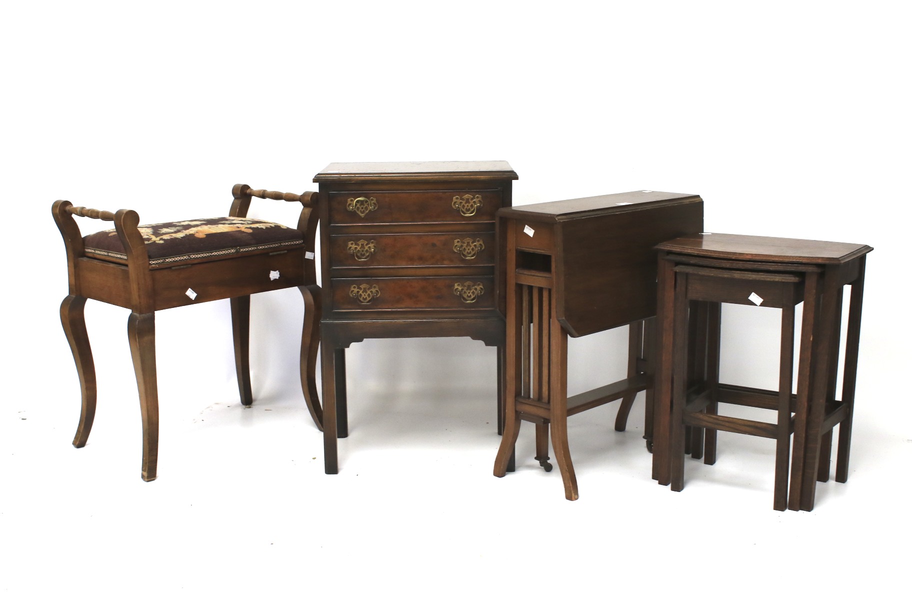 A bedside table, nest of three tables, Sutherland table and a piano stool.