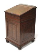 A 19th century mahogany davenport.