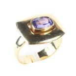 A Nicholas Wylde 18ct gold and tanzanite set ring. Weight 8.