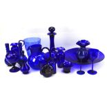 A collection of Bristol blue and other glassware.