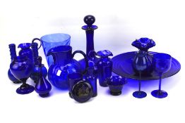 A collection of Bristol blue and other glassware.