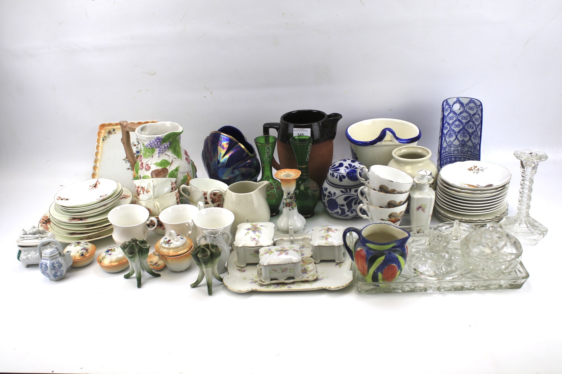 An assortment of ceramics and glassware.