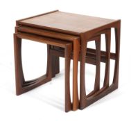 A G-Plan nest of three teak Quadrille occasional tables.