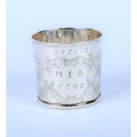 A white metal beaker.