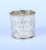 A white metal beaker.