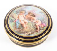 A 20th century Limoges porcelain blue-ground circular box and cover.