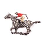 A vintage paste racehorse & jockey brooch.