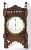 A late 19th century oak framed barometer.