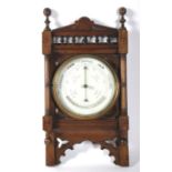 A late 19th century oak framed barometer.