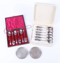 A cased set of six sterling silver spoons, another with six silver plated spoons,