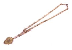 An early 20th century 9ct rose gold fancy link Albert or watch chain.