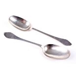 A pair of early 19th century Scottish silver serving spoons.