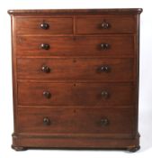 A large Victorian mahogany chest of drawers.