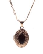 A 9ct gold small oval locket and chain.