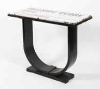 An Art Deco style side table with enamelled London street sign top.