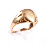 A late Victorian 18ct gold shield-shaped signet ring.